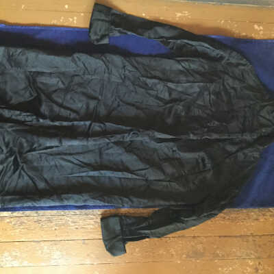 Black silk/satin robe, back shoulder pleats, long sleeves with cuffs, matching silk belt