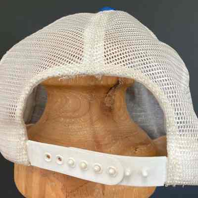 Stephen Schlinger's Troy Little League Team cap - back: A white mesh cap is displayed on a wooden mannequin, exposing the adjustable back strap detail.
