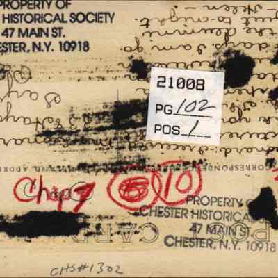 Address side of "View from University Heights . . . East Chester, N. Y. postcard.: This image shows the back of the postcard an aged and stained document with several stamps and markings, identifying it as the property of the Chester Historical Society located at 47 Main St, Chester, N.Y. 10918. The document features overlapping texts in black ink, some obscured by black ink blotches, and red notations visible. A white label is affixed with numbers and the text "PG/102 POS_" indicates that the "View from University Heights" image was used in the 1992 Villgae of Chester Centennial book.