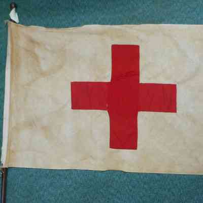 Red Cross Flag on pole
