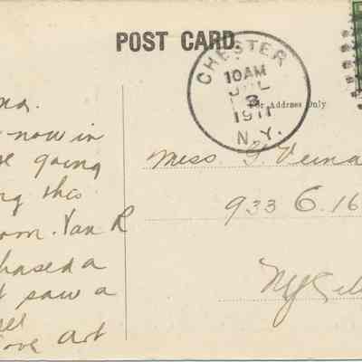 Address side of the "High Street and Road leading to Newburgh, Chester, N. Y." postcard.: The address side of this postcard, postmarked July 3, 1911 in Chester, NY. It features a one-cent U.S. postage stamp and cursive handwriting addressing Miss G. Veimaus of 933 E. 167 St. in New York City. The message mentions the sender is in the village going fishing, had a dog chase a rabbit, and saw a squirrel, signed Art. The postcard is "Hand Colored" as noted, and it was produced by P. Christaldi, Chester, NY.