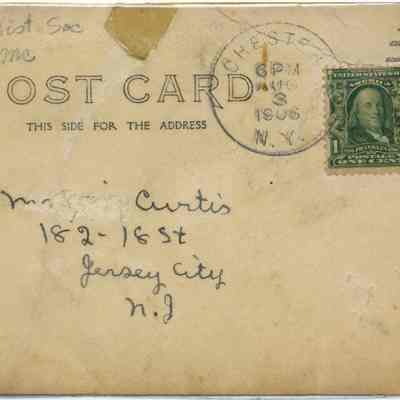 Address side of the "Proposed Chester Public School" postcard: The address side of the "Proposed Chester Public School" postcard features a canceled one-cent Benjamin Franklin stamp in green, postmarked from Rochester, NY, dated 6 PM, Aug 23, 1905. The postcard is addressed to "[M]iss M[unreadable] Curtis" at "182 - 18 St, Jersey City, N.J." The upper left corner has handwritten notes, and the card has aged with some stains and a torn top left corner.