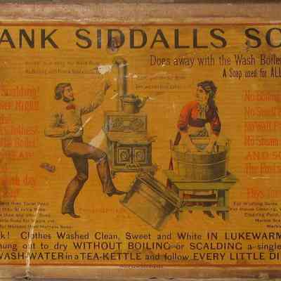 Wooden Box lid interior.: The vintage advertisement promotes Frank Siddalls soap, highlighting its easy washing benefits.