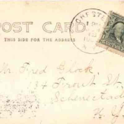 Reverse of "Sight Seeing, Chester, N. Y." post card.: The image is of an old postcard featuring handwritten cursive script addressed to "Mr. Fred Glick, 747 Frank St., Schenectady, N.Y." It includes a green one-cent stamp with Benjamin Franklin's profile, postmarked "Chester, N.Y., 1 PM June 15, 1907." The top of the postcard is labeled with the word "POST CARD" in bold, and there's a stipulation that "This Side For The Address."