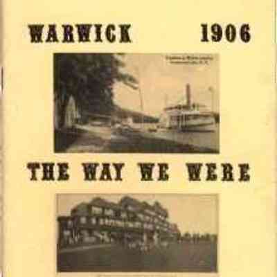Warwick 1906 The Way We Were: The image features the cover of a book titled "Warwick 1906: The Way We Were" by Richard W. Hull. The cover is a vintage-looking design with a yellowish background and bold black text. It includes two black-and-white photographs; the upper photograph appears to depict a boat or ship alongside a body of water with trees and structures visible in the background, while the lower photograph shows a large, historic building, possibly a hotel.