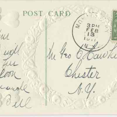 Address side of the "Valentine card to George Hawkins from his Uncle Bill" greeting postcard: The address side of the postcard features a decorative border and embossed designs, containing cursive handwritten text and a green one-cent stamp featuring Benjamin Franklin. The postmark dated February 13, 1911, Mom{unreadable], NY to Chester, New York. The greeting was from "Uncle Bill" communicating to George Hawkins that Uncle Bill would answer her letter soon. The postcard also features traditional postal markings.