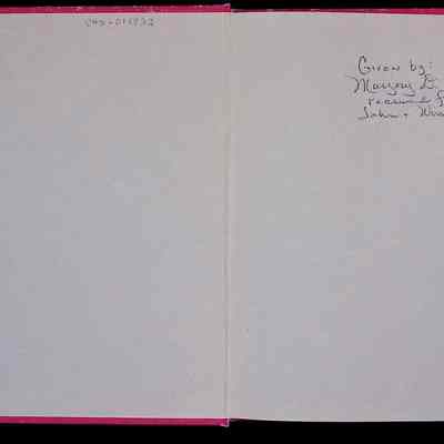 The image displays an open book with a plain white left page showing a price tag of $15.00 and the text "SMITH CLOVE PRESS Central Valley, New York 10917" at the bottom, while the right page features a handwritten note stating "Given by: Marjorie B. Foster received from John + Winnie Miller" with the date "2013" at the top right.