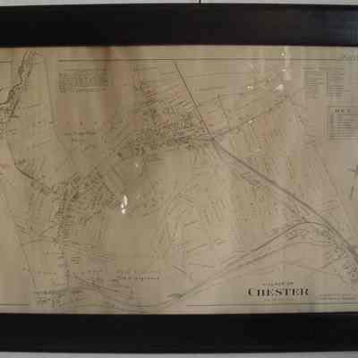 1903 Village of Chester Map: The framed image displays a vintage map labeled "Village of Chester," depicting detailed layouts and landmarks.