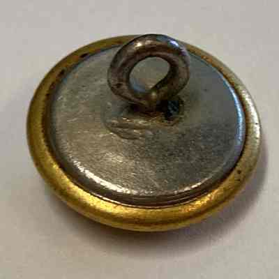 "P" Brass Button back.: The image shows a metallic button with a gold rim and a looped shank.