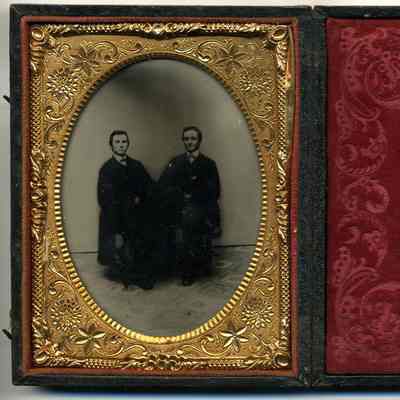 Two seated gentlemen