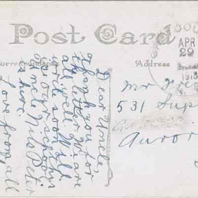 Assress side of the "Chester, (N. Y.) - Public School" postcard.: The image shows an antique postcard featuring intricate handwriting across the left side under the header "Post Card," with distinct sections for correspondence and address. A red two-cent U.S. postage stamp commemorating George Washington is affixed at the top right corner, postmarked with the date "April 29, 1918." The postcard is addressed to "Mr. Fred Nelson" at "531 Superior St., Aurora, Ill."