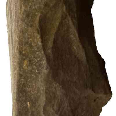 1762 "Roe Homestead" Cornerstone - left end: A rough, shale stone with angular edges is positioned against a white background.