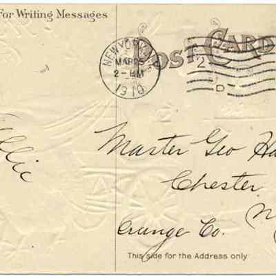 Address side of the "A Joyful Easter" Greeting Postcard.: The image shows an old, textured postcard featuring an elegant embossed design in the background. It is addressed to "Master Geo Hawkins, Chester, Orange Co., N.Y." and was sent from New York on March 25, 1910, at 2 PM. The postcard contains a one-cent stamp and a postmark indicating the date and time of mailing. There is a handwritten name "Allie" on the left side, indicating either the sender.