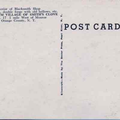 Address side of the "Interior of Blacksmith Shop at Old Museum Village Of Smith's Clove" postcard: This image shows the back of a vintage postcard featuring descriptive text about the interior of a blacksmith shop located at the "OLD MUSEUM VILLAGE OF SMITH'S CLOVE" in Orange County, New York. The text mentions features such as ox stock and a double forge with old bellows. The postcard is published by Syretidan and Henry, 704 Lakes St., Monroe N.Y., and printed by The Dexter Press in a series known as "Silvercraft."