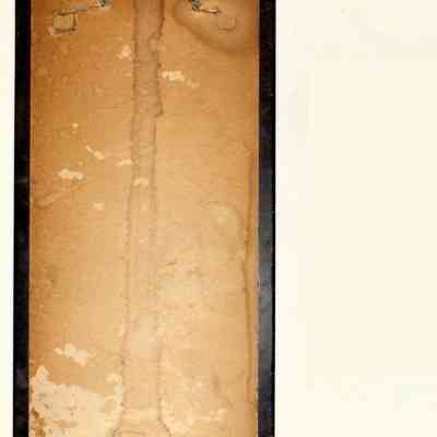 Feldner's Lunch Room and Ice Cream Parlor Thermometer - back: The image shows an empty rectangular frame with a worn, textured backing and frayed hanging cord.