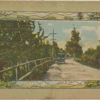 Souvenir Folder of Chester (reverse of exterior): The image depicts a serene, tree-lined rural road featuring a horse-less carriage, under a sunny sky.