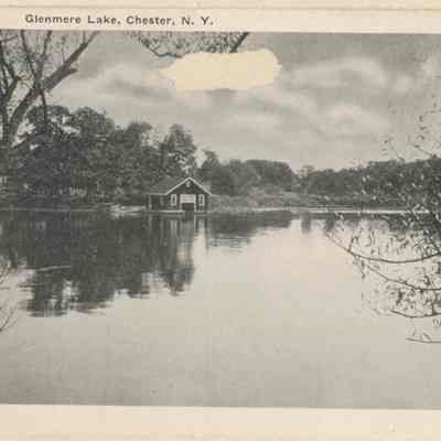 Glenmere Lake.: The image shows a serene view of Glenmere Lake in Chester, N.Y., featuring reflective waters.