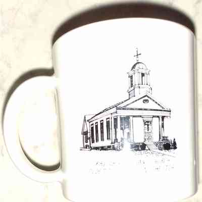 Chester Centennial Cup - side b: A white mug with a black line drawing of the Presbyterian Church, the Oldest Church building in Chester..