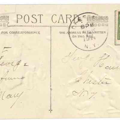 Address side of the "Compliments of the Season" postcard.: The address side of this postcard features a classic design that includes a designated top left section for correspondence and a top right section for addressing. It bears a one-cent green Benjamin Franklin stamp, canceled with a circular postmark dated April 15, 1911, in Chester, N.Y. (New York). The card has handwritten text addressed to "George Hawkins" from "Mary." The phrase “POST CARD” is boldly printed at the top, emphasizing its purpose and era of use.
