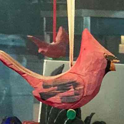 Pair of carved Cardinal (bird) ornaments