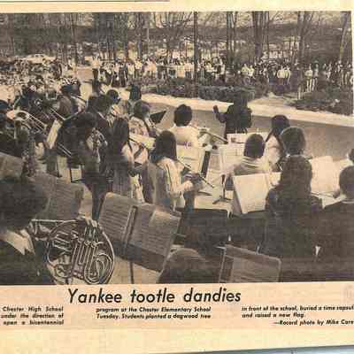 '75–'76 Band 3: A band performs outdoors at a school event, with an audience watching in the background.
