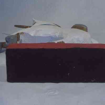 Unicorn - bottom: The image shows a carved wooden unicorn statue on a rectangular base.