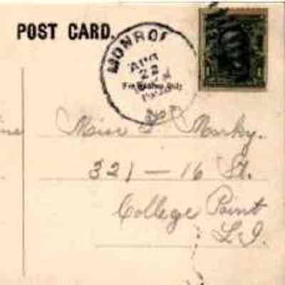 Message side of "View of Sugar Loaf Mountains from High School, Chester, N.Y." post card: The image displays an old postcard with handwriting, featuring a green one-cent stamp in the upper right corner. The postmark indicates it was mailed from Monroe, N.Y. on Aug 22, 1908, and it's addressed to Maise L. Marky in College Point, L.I., New York. The left side of the card includes brief, cursive script, signifying a personal message.