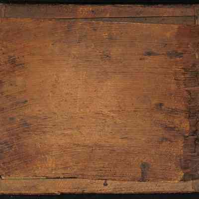 Vernacular picture Frame - back: The image displays an old, wooden board with visible grain patterns and tied cords on its edges.
