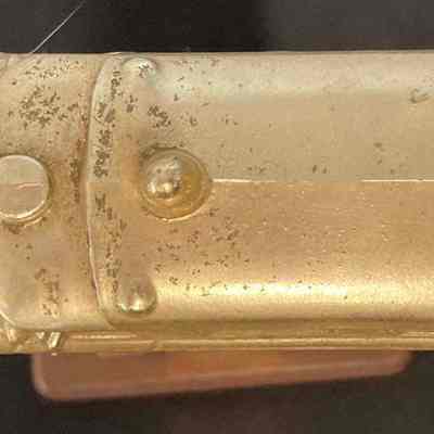 Chart Member Chester Volunteer Ambulance Corp - Henry Lutjens - Top: The image shows the top of a golden ambulance trophy atop a wooden base.