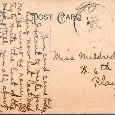 “Hambletonian's Monument, Chester, N. Y.” Back: The image shows the back of an old postcard, marked with various postmarks and handwriting. The top left corner features a circular "NEWYORK N.Y. STA. Y" postmark dated April 17, [?]. A one-cent green U.S. Benjamin Franklin postage stamp is affixed in the top right corner. The postcard is addressed to "Miss Mildred Greene, N. 6th St, Plainfield, N.J." The message, written in cursive script, fills the left side of the card, and it mentions that the sender wished the recipient were coming the next day and mentions something about it raining hard. The card itself is noted No.D 5934 Pub. by Merchants Commission Co, Middletown, N. Y and to have been printed in Germany.  there is a serial number "187709" towards the bottom right.