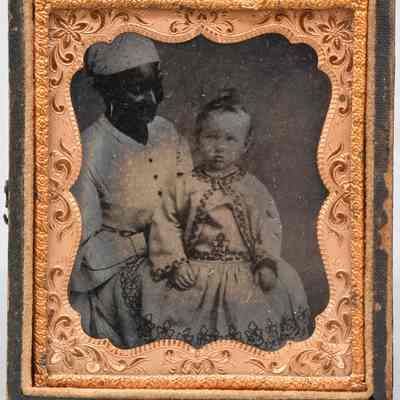Nanny Holding Child