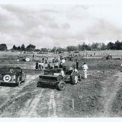 Tractors clearing fields