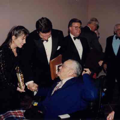 George & Susan Allen Shaking Hands with Guest at 50th Anniversary Dinner