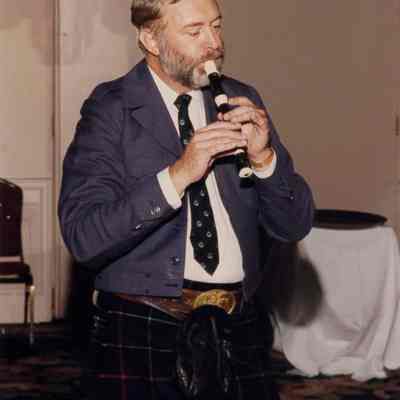 John R. Turner Plays Recorder for Guests at 50th Anniversary Dinner