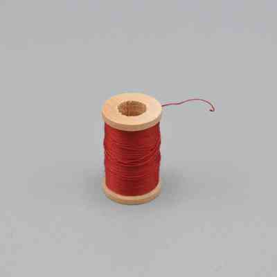 Spool of Red Thread