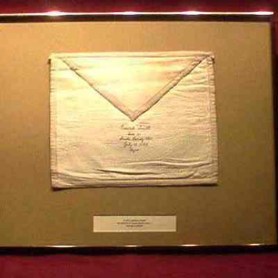 Apron: White lambskin, 11 1/2" x 14" framed