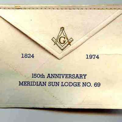 Apron: Small leather apron commemorating the 150th Anniversary of Meridian Lodge #69, dated 1824-1974