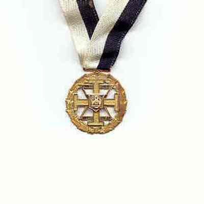 Jewel: Scottish Rite Commander in CHief Jewel belonging to James Harbage. Gold color with black and white neck ribbon