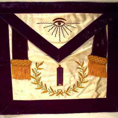 Apron: Grand Lodge Officer, Junior Grand Warden. Purple and white