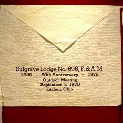 Apron: White paper with blue printing. SUlgrave Lodge #696 F. & A. M., Outdoor meeting, September 1, 1975, Lisbon, Ohio. 1925 - 50th Anniversary - 1975