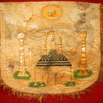 Apron: White with gold trim with name Philip Schaus. Very fragile