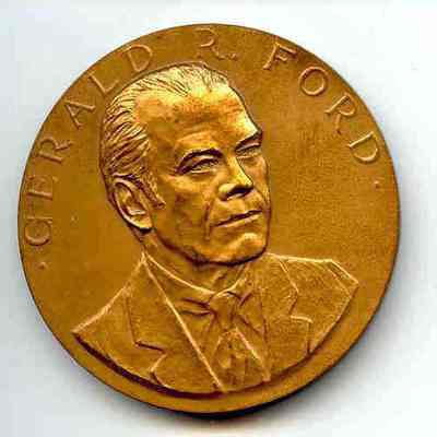 Coin: Commemorative medal of Gerald R. Ford. U.S. Mint #140. Obv: Three quarter portrait of Ford. Rev: Presidential seal.