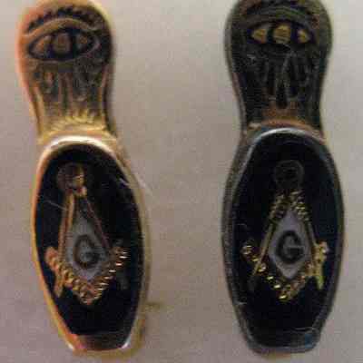 Pin, Fraternal: Slipper lapel pin. 1/2" long, gold. Has a Square and Compass and an All Seeing Eye on it.