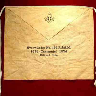 Apron: White paper with blue print. 12" x 15". Avery Lodge #493, 1874 - Centennial - 1974, Hilliard Ohio