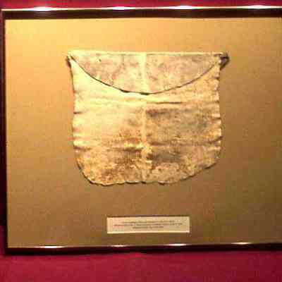 Apron: Lambsking apron belonging to Joseph K. Smith, initiated June 21, 1816. Nova Caesrea Harmony Lodge #2, Cincinnati, Ohio. Under flap Joseph K. Smith initiated June 21, 1826. 13" x 11"