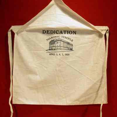 Apron: White cotton. Under flap: "Dedication of Masonic Temple, April 3, 1928 A.L. 5928