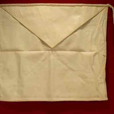 Apron: From Bedford Lodge #375 belonging to S. Norris. White leather with cords