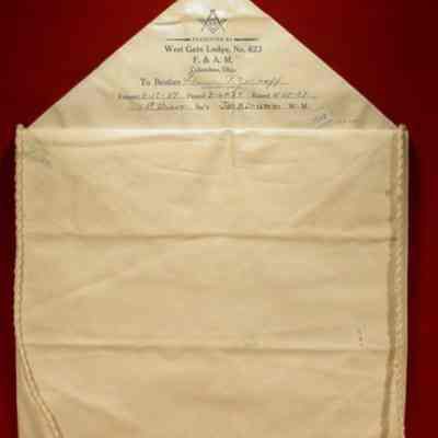 Apron: White lambskin. 13" x 15". Presented by Westgate Lodge #623 F. & A. M. To: Bro Thomas P. Zelpoff, EA 3/15/37 FC 3/29/37 MM 4/29/37