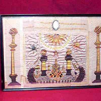 Apron: White apron with printed working tools and emblems, also sash with columns and globes