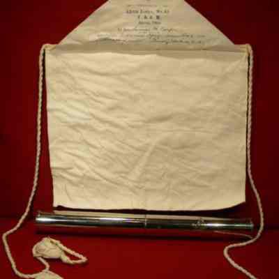 Apron: White leatyher apron presented to Samuel M. Carper, dated October 9, 1920. Signed by R. A> Walker, Jr., W.M. and Thomas J. Edwards, Secy. In chrome tube and black case.